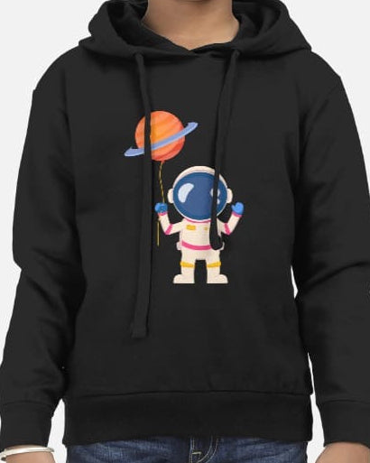 Child wearing a black hoodie with an astronaut and balloon design on a white background